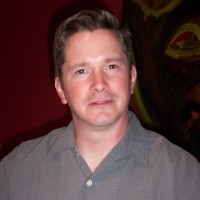 Byron Brooks Clean-shaven man with brown hair